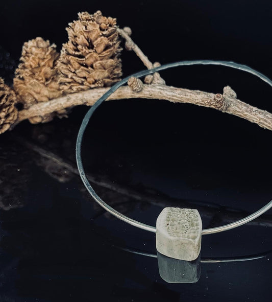 Terra Bangle with Trabecular Bone Charm
